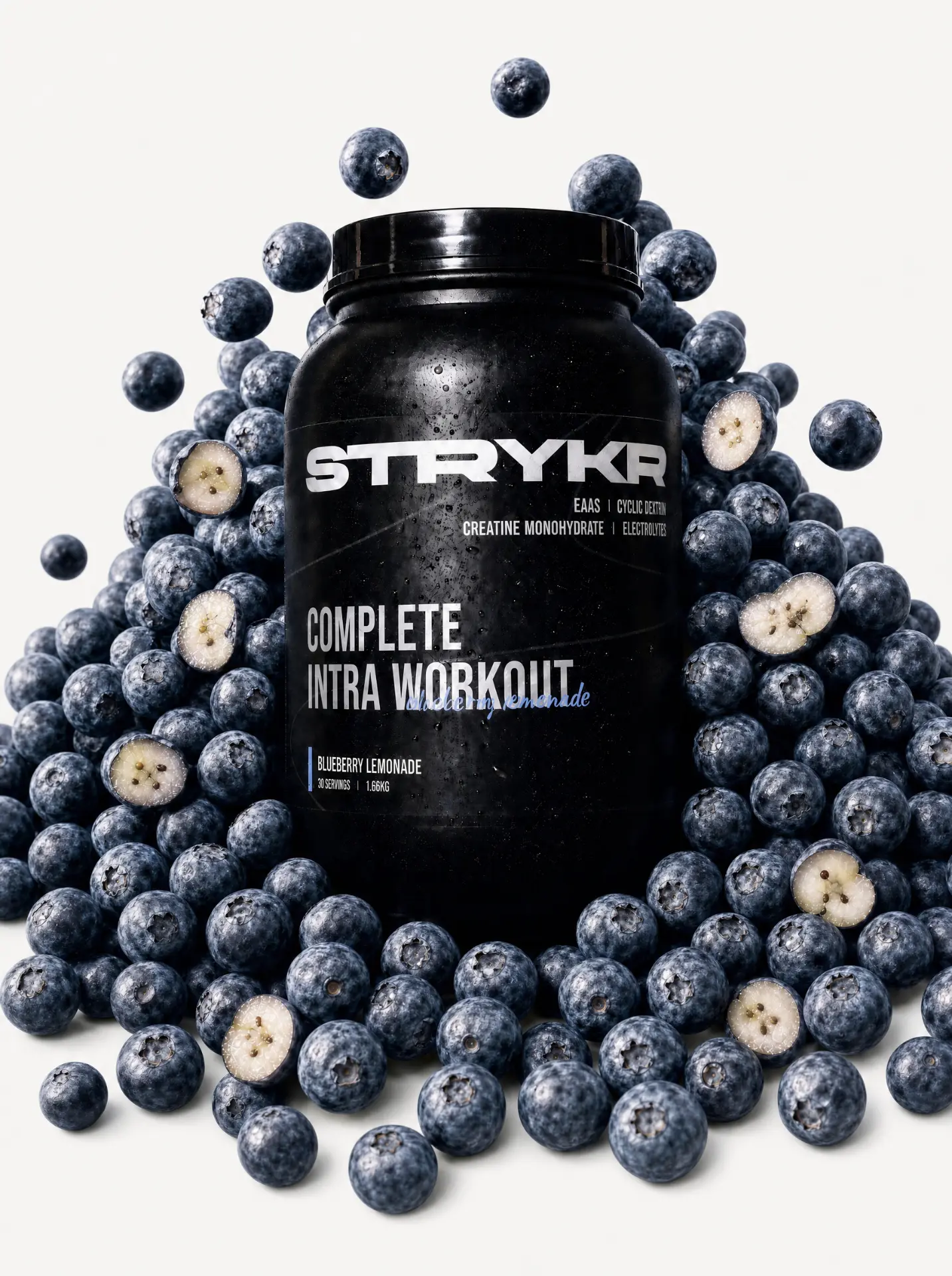 Complete Intra Workout Blueberry Lemonade tub surrounded by fresh blueberries